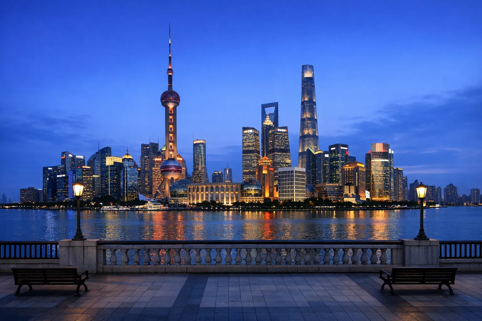 The Pudong skyline of Shanghai seen across the river from the historic Bund waterfront.